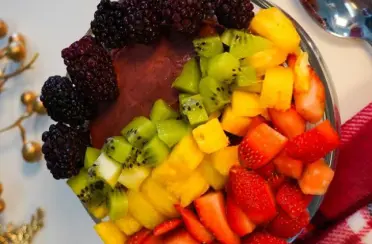 Delicious fresh fruit on top of a bowl full of the best gelato in Charlotte